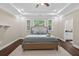 Beautiful main bedroom with hardwood floors, trey ceiling, and windows bringing in natural light at 338 Mount Zion Rd, Oxford, GA 30054