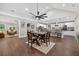 Open-concept living space with dining area, kitchen, and hardwood floors at 338 Mount Zion Rd, Oxford, GA 30054