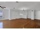 Spacious living area featuring hardwood floors, white walls and trim, with natural light at 3655 Habersham Ne Rd # B-254, Atlanta, GA 30305