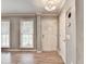 Inviting entryway featuring hardwood floors and natural light, creating a warm first impression at 4562 Lucerne Valley Sw Rd, Lilburn, GA 30047