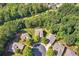 Scenic aerial view of a home nestled within a peaceful cul-de-sac, surrounded by lush greenery and nature at 601 Laurel Xing, Canton, GA 30114