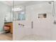 Bathroom with glass shower, vanity, mirror, tile floor, and natural light from window at 601 Laurel Xing, Canton, GA 30114