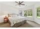 Bedroom with a double bed, natural light from windows and a ceiling fan at 601 Laurel Xing, Canton, GA 30114