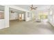 Bonus room featuring a ceiling fan, access to a patio and a partial wall at 601 Laurel Xing, Canton, GA 30114