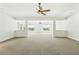 Bright bonus room featuring neutral walls and a ceiling fan at 601 Laurel Xing, Canton, GA 30114
