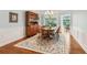 Elegant dining room featuring a traditional hutch, spacious layout, and abundant natural light at 601 Laurel Xing, Canton, GA 30114