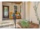 Charming front porch with rocking chairs and decorative wreath at 601 Laurel Xing, Canton, GA 30114
