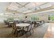 Expansive great room with chandeliers, tray ceiling, neutral walls and plenty of natural light at 601 Laurel Xing, Canton, GA 30114