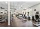 Community gym featuring treadmills, exercise bikes, weight machines, and ceiling fans at 601 Laurel Xing, Canton, GA 30114