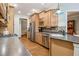 Well-equipped kitchen with stainless steel appliances and granite countertops at 601 Laurel Xing, Canton, GA 30114