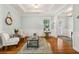 Cozy living room boasting natural light, sophisticated decor, and comfortable seating at 601 Laurel Xing, Canton, GA 30114