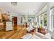 Bright open living room with hardwood floors, fireplace and a view of the kitchen at 601 Laurel Xing, Canton, GA 30114