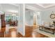 Bright living room with hardwood floors leading to dining area at 601 Laurel Xing, Canton, GA 30114