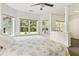 Bright main bedroom featuring many windows that provide beautiful views of the surrounding landscape at 601 Laurel Xing, Canton, GA 30114