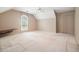 Bedroom featuring vaulted ceiling, window, ceiling fan, closet, and a built in desk at 109 Lake Latimer Ne Cv, Kennesaw, GA 30144