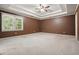 Large bedroom features crown molding, ceiling fan, and a window allowing plenty of natural light at 109 Lake Latimer Ne Cv, Kennesaw, GA 30144