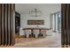 Contemporary dining room featuring a wooden table, unique chairs, and stylish decor at 1301 Peachtree Ne St # 4L, Atlanta, GA 30309