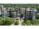 A luxurious apartment complex with modern architecture and lush landscaping at 1301 Peachtree Ne St # 4L, Atlanta, GA 30309