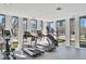 Well-equipped gym with treadmills, elliptical machines, and large windows offering city views at 1301 Peachtree Ne St # 4L, Atlanta, GA 30309