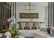 Open-concept living room and dining room with stylish decor and modern furnishings at 1301 Peachtree Ne St # 4L, Atlanta, GA 30309