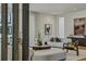 Modern living room with stylish furniture and a view to the outside at 1301 Peachtree Ne St # 4L, Atlanta, GA 30309
