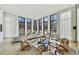 Relaxing lounge area with comfortable chairs, large windows, and hardwood floors at 1301 Peachtree Ne St # 4L, Atlanta, GA 30309