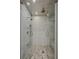Sleek walk-in shower with dual shower heads and neutral-toned tile at 1301 Peachtree Ne St # 4L, Atlanta, GA 30309