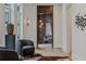 Inviting sitting room with decorative vases, lighting, and plush seating area at 1301 Peachtree Ne St # 4L, Atlanta, GA 30309