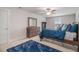 Bedroom featuring carpet, a ceiling fan, a window, and furniture at 2 Whites Pond Rd, Moreland, GA 30259