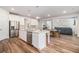 Spacious kitchen with large island, stainless steel appliances, and open floor plan at 2 Whites Pond Rd, Moreland, GA 30259