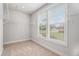 Walk-in closet with shelving and a view of the outdoors from the window at 2 Whites Pond Rd, Moreland, GA 30259