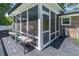 Nice screened porch with chairs at 3152 H D Atha Rd, Covington, GA 30014