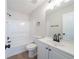 This bathroom features a tub, toilet, vanity, and modern fixtures at 5916 Farmbrook Ln, Rex, GA 30273