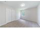 Cozy bedroom featuring new carpet, closet, and bright window at 5916 Farmbrook Ln, Rex, GA 30273
