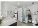 Modern bathroom features a glass shower, floating vanity with white countertops, and neutral wall paint at 788 W Marietta Nw St # 308, Atlanta, GA 30318