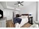 Well-lit main bedroom with a bed, dresser, and ensuite bathroom at 788 W Marietta Nw St # 308, Atlanta, GA 30318
