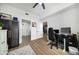Spacious home office with hardwood floors, ample desk space, and a ceiling fan at 788 W Marietta Nw St # 308, Atlanta, GA 30318