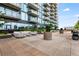 A rooftop patio offers comfortable seating, lush greenery, and views of the city skyline at 788 W Marietta Nw St # 308, Atlanta, GA 30318