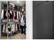 Spacious walk-in closet provides ample storage with hanging racks, shelving, and compartments for accessories at 788 W Marietta Nw St # 308, Atlanta, GA 30318