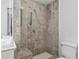 Contemporary bathroom with a tiled walk-in shower and accessibility handrails at 872 Briarcliff Ne Rd # B2, Atlanta, GA 30306