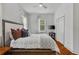 Comfortable bedroom with hardwood floors, neutral colors, and lots of natural light at 872 Briarcliff Ne Rd # B2, Atlanta, GA 30306