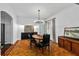 Stylish dining room with hardwood floors, chandelier, and view to kitchen at 872 Briarcliff Ne Rd # B2, Atlanta, GA 30306