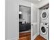 Convenient laundry area with stacked washer and dryer, located off the living room at 872 Briarcliff Ne Rd # B2, Atlanta, GA 30306