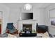 Comfortable living room featuring a fireplace, neutral colors, and classic design at 872 Briarcliff Ne Rd # B2, Atlanta, GA 30306