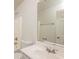 Bright bathroom featuring a tub, shower with white tile surround, and a white vanity at 113 Garden Walk, Stockbridge, GA 30281