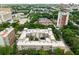 Aerial view showcasing the building's layout, courtyard, surrounding greenery, and urban proximity at 384 Ralph Mcgill Ne Blvd # 123, Atlanta, GA 30312