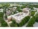 Aerial view showing courtyard pool, community landscaping, and proximity to town at 384 Ralph Mcgill Ne Blvd # 123, Atlanta, GA 30312