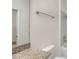 Bright bathroom with granite counters, white cabinetry, and tiled shower-tub at 384 Ralph Mcgill Ne Blvd # 123, Atlanta, GA 30312