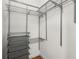 Spacious walk-in closet with custom shelving and ample storage space at 384 Ralph Mcgill Ne Blvd # 123, Atlanta, GA 30312