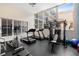 Bright condo gym with cardio machines, weight equipment, and large windows for a refreshing workout environment at 384 Ralph Mcgill Ne Blvd # 123, Atlanta, GA 30312